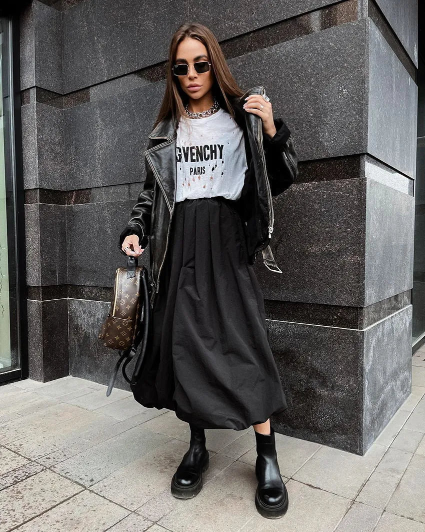 Women's solid colour long cotton skirt in black on a hanger