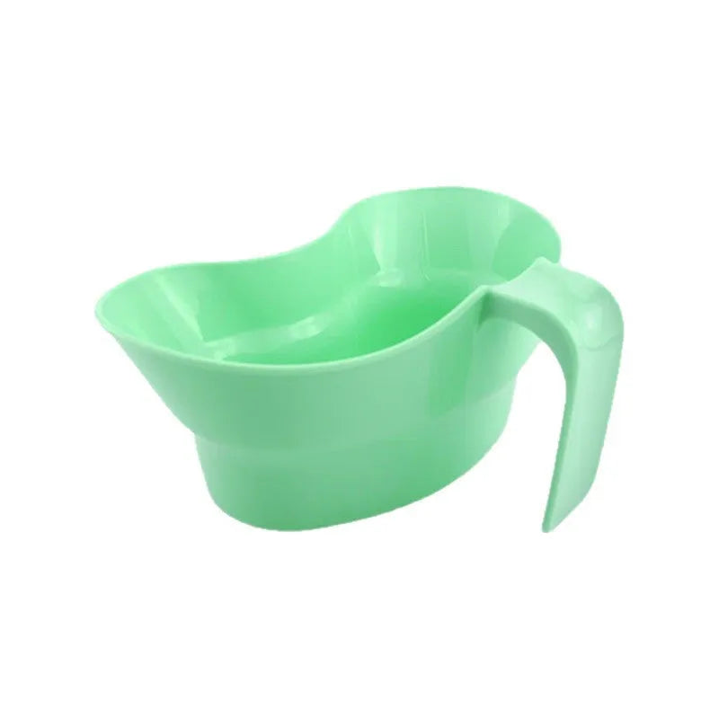 Green plastic gargle cup for elderly patient oral care assistance