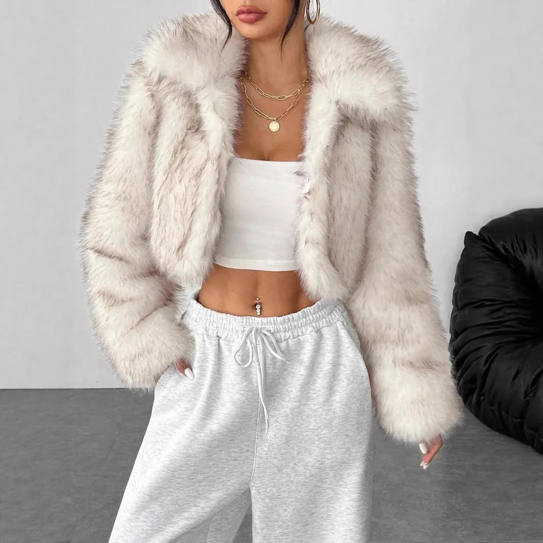 Artificial fur coat with fox fur style design in black tip colour variation