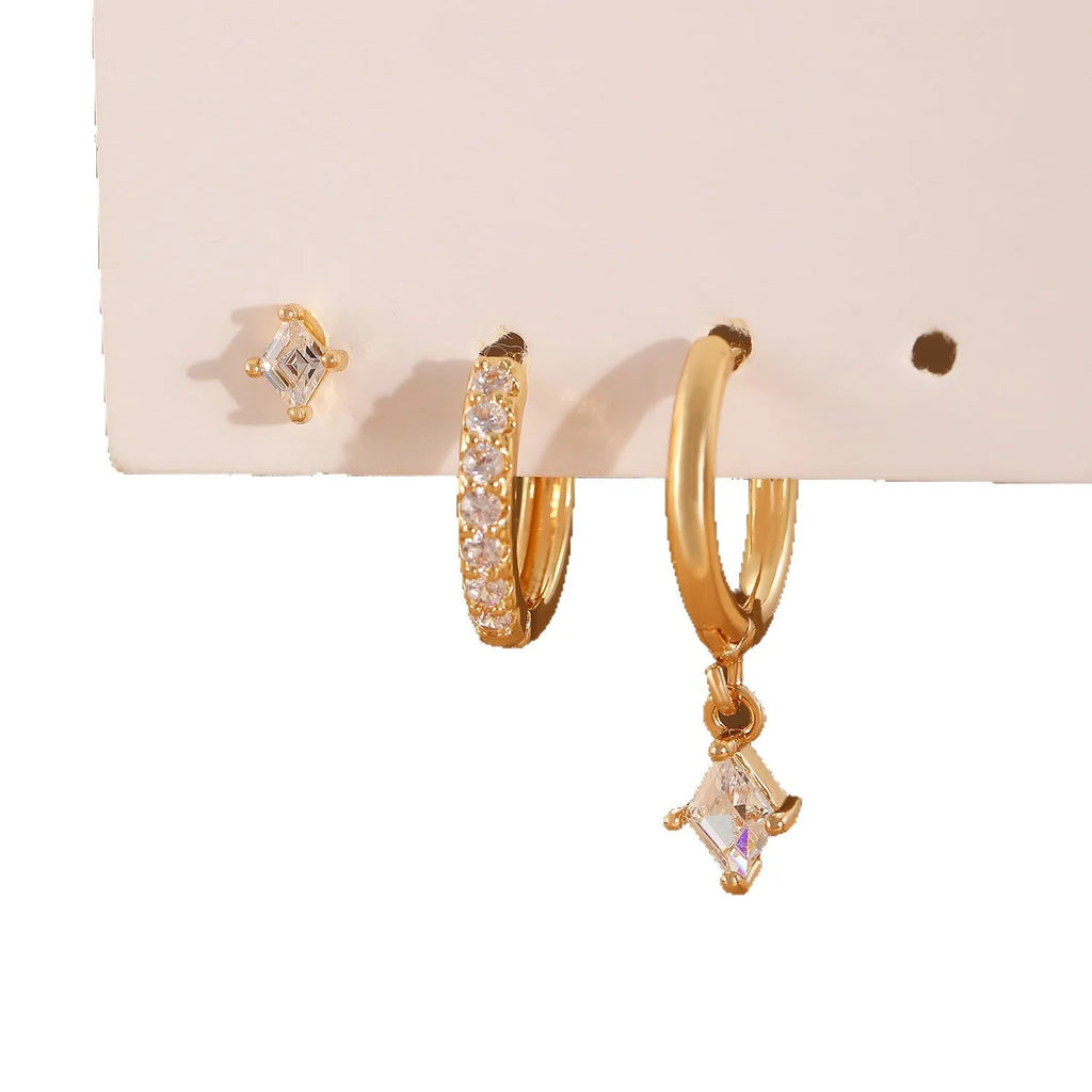 Ladies three-piece earring set with geometric design and zircon inlaid accents in gold colour