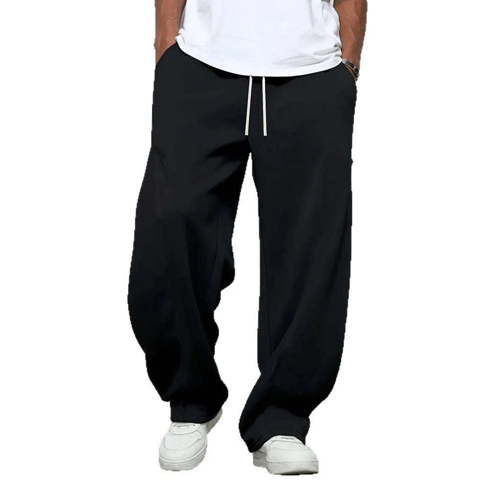 Men's solid colour casual trousers with a micro-elastic waistband and straight-leg cut.
