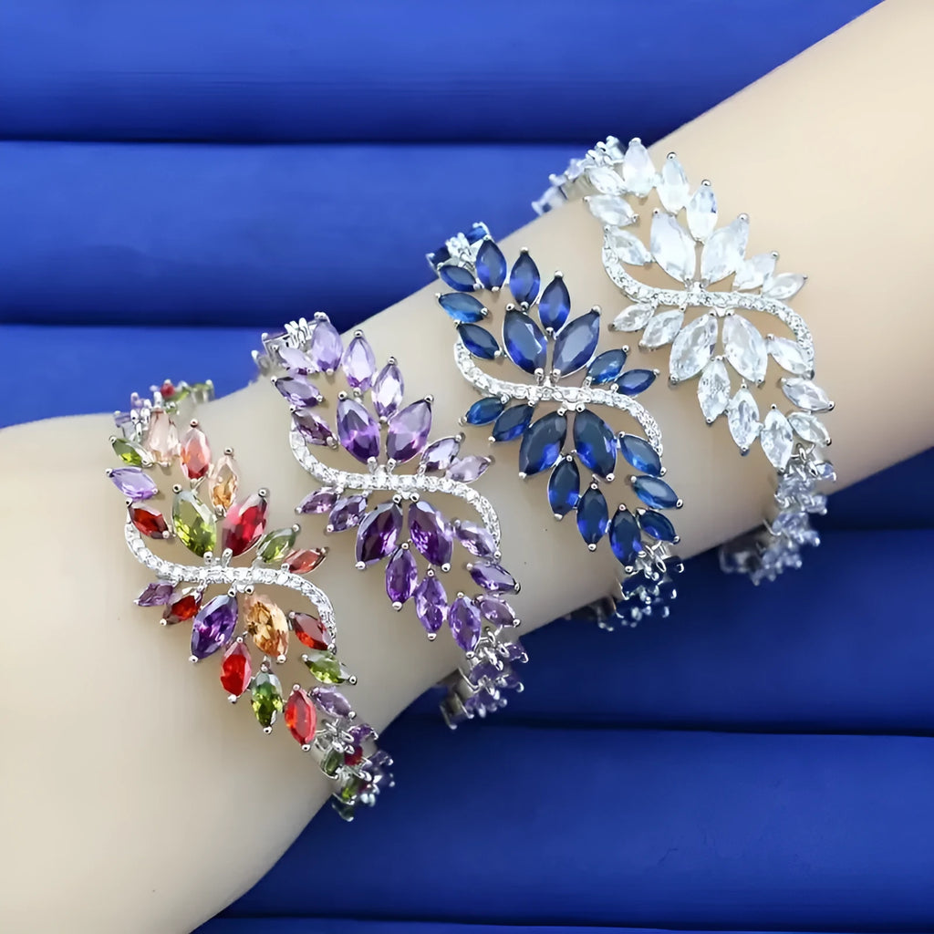 Gold electroplated bracelet with colourful zircon stones and ice flower pattern detailing on copper base