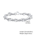 A thick, geometric stainless steel chain bracelet shown on a wrist, highlighting its handmade links and steel colour.