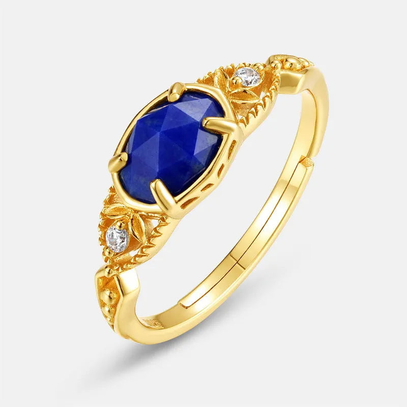 Geometric ellipse silver alloy ring with a round blue lapis lazuli stone, Japanese style design.