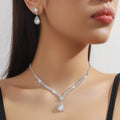 Women's claw chain necklace and earrings set with drop-shaped rhinestone pendants