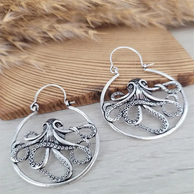 Antique silver octopus earrings with retro styling on zinc alloy construction
