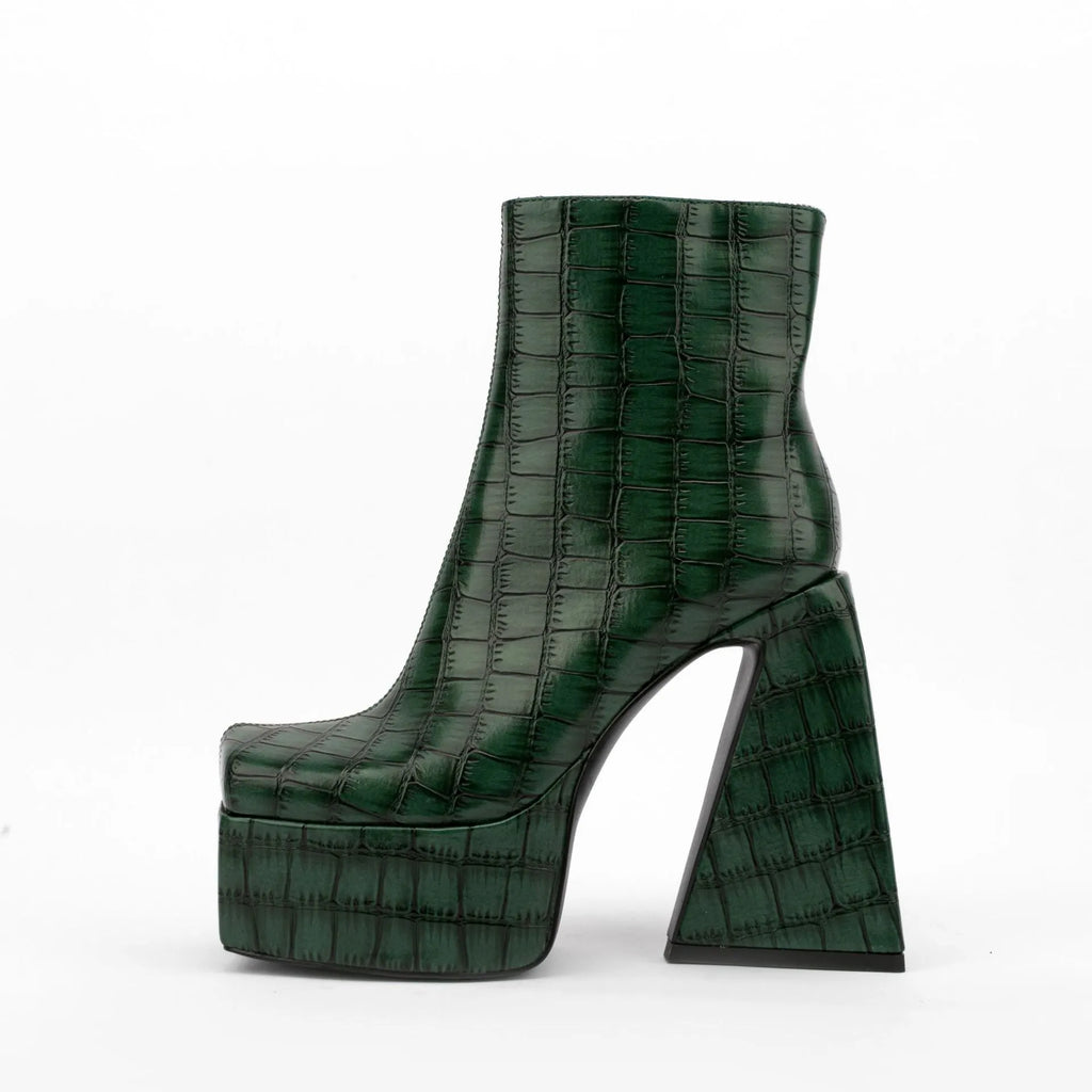 Women's ankle boots with a super high heel in artificial PU, shown in beige colour.