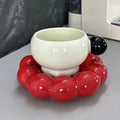 Nordic style ceramic coffee cup and dish set in a solid colour, showing high temperature resistant material.