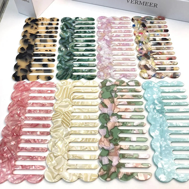 Acetate hair comb with geometric retro wave design in various colours.