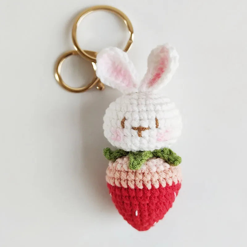 White hand-woven wire pendant with rabbit strawberry pattern and keychain attachment