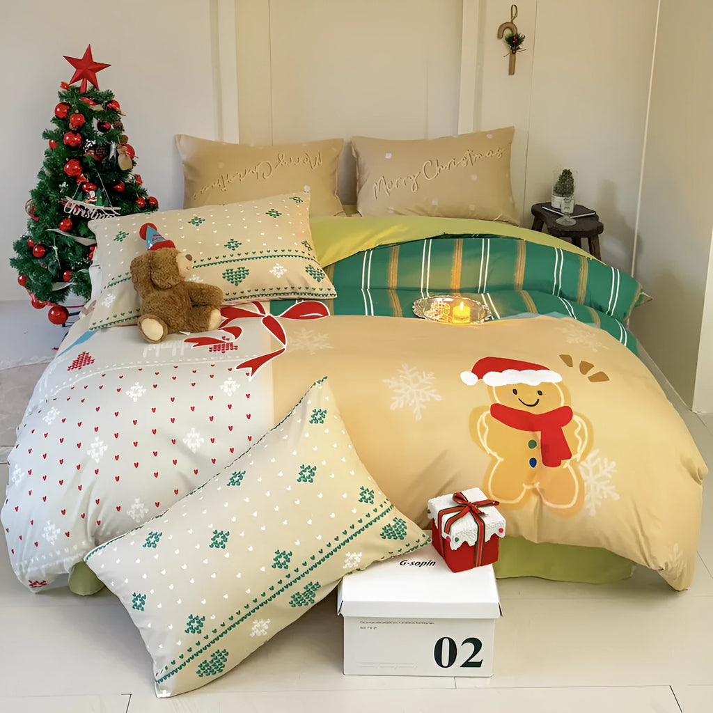 Christmas cartoon themed four-piece bedding set with duvet cover, fitted sheet and pillowcases on a bed.