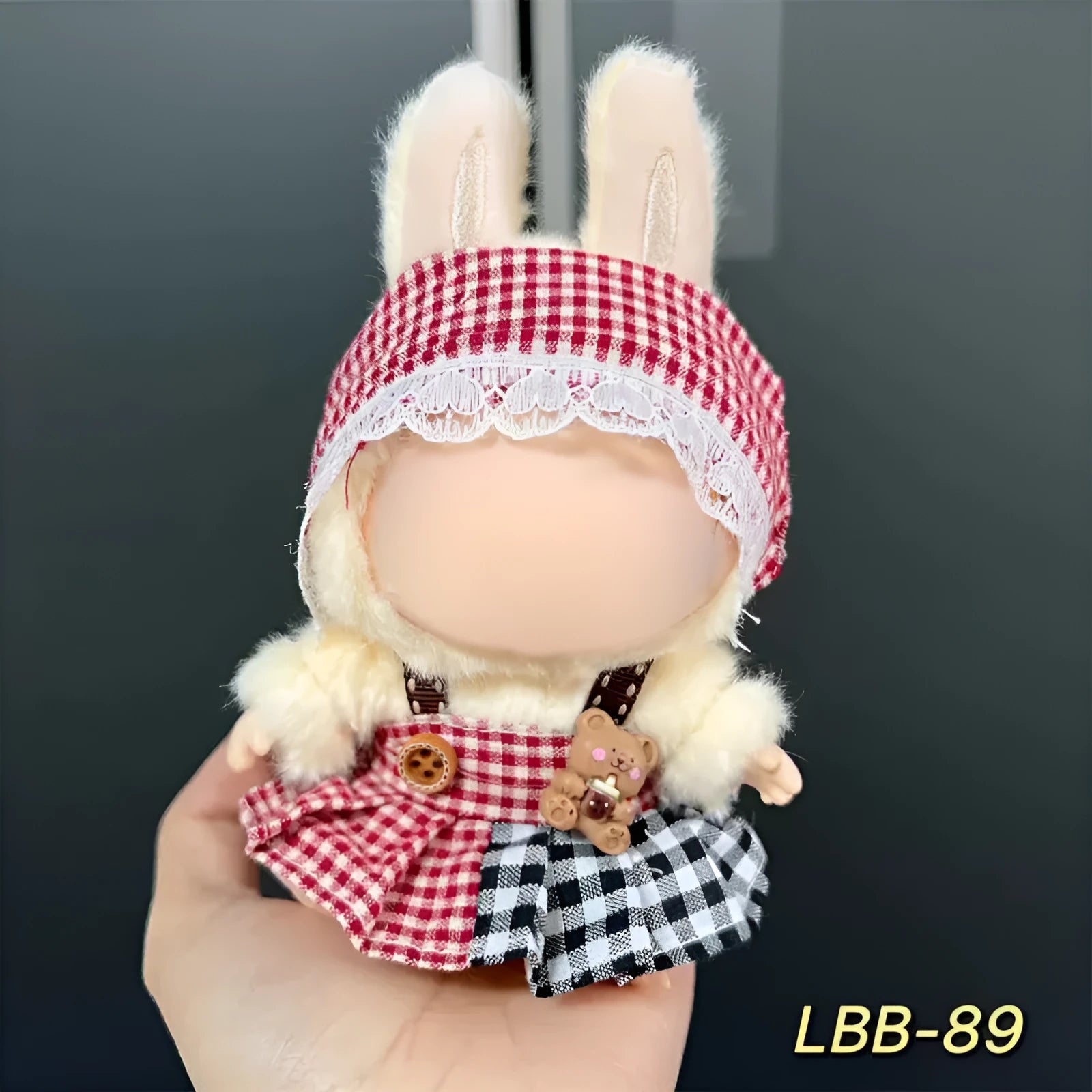 Plastic clothing outfit for a 17cm tall collectible vinyl figurine doll.