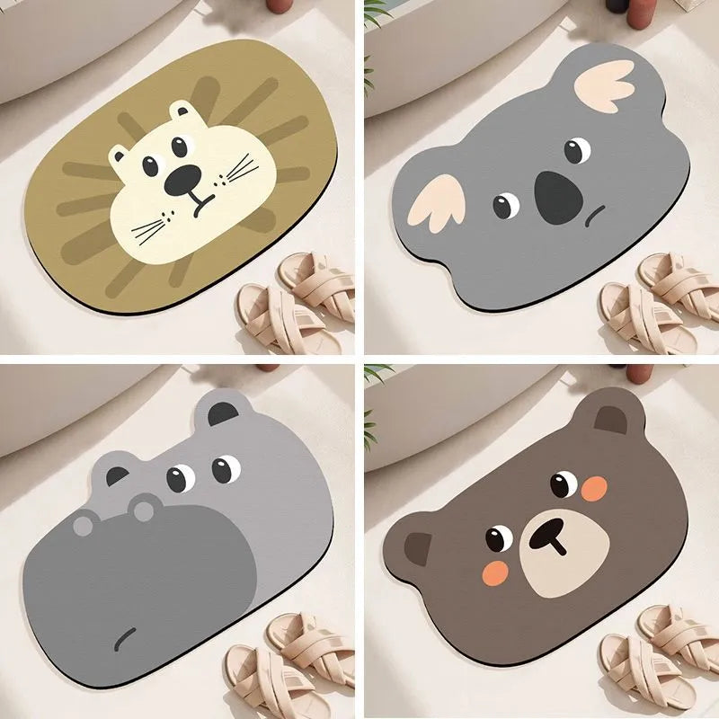 Cartoon animal diatom ooze absorbent bathroom mat in alien shape on bathroom floor.