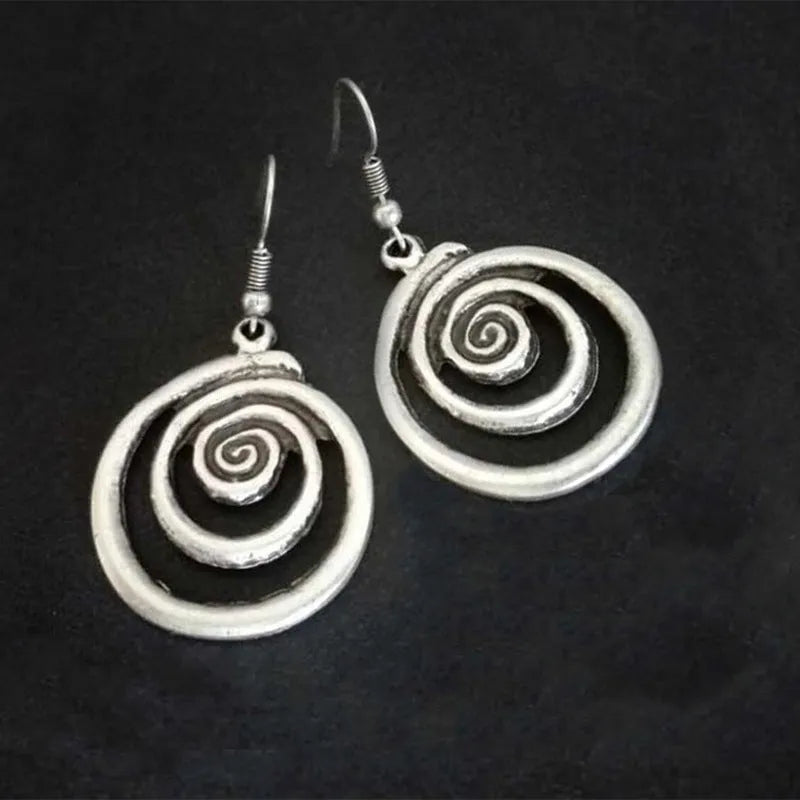 Silver alloy geometric spiral distressed drop earrings with national style, shown front-on.