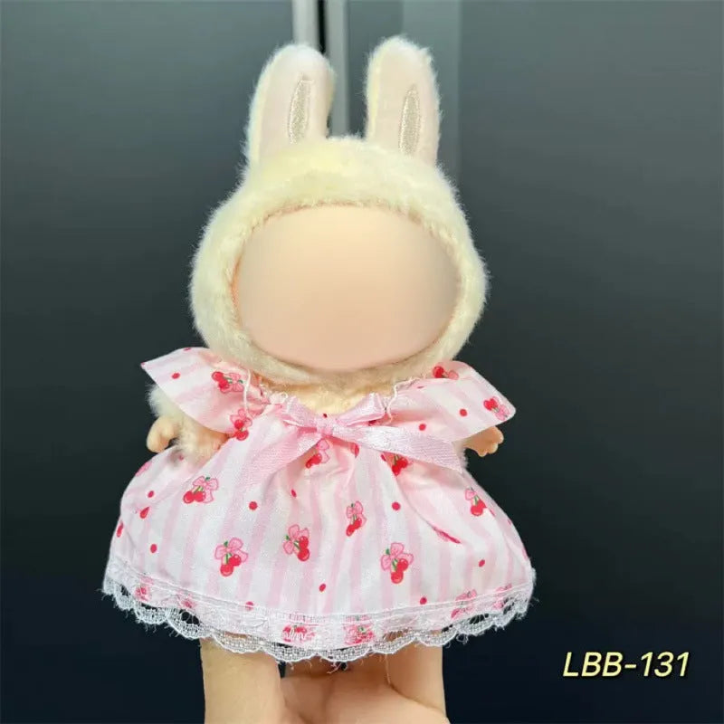 Plastic clothing outfit for a 17cm tall collectible vinyl figurine doll.