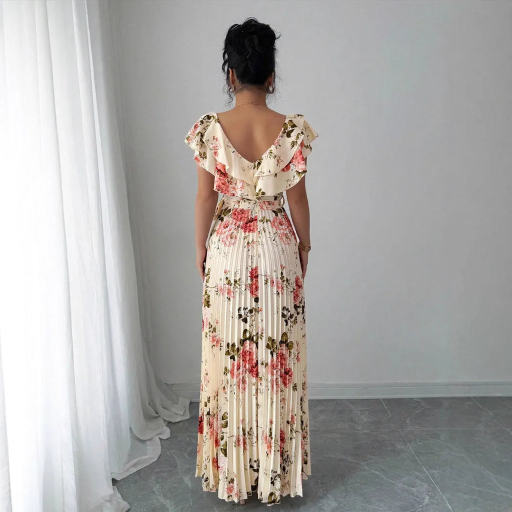 Apricot V-neck floral print dress with ruffled sleeves and an oversized swing skirt.