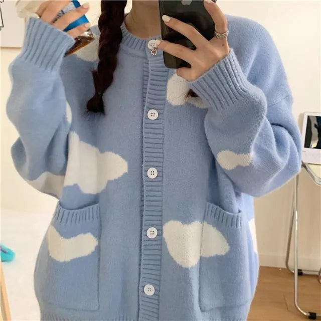 Women's blue cloud pattern cardigan sweater with loose fit and long sleeves