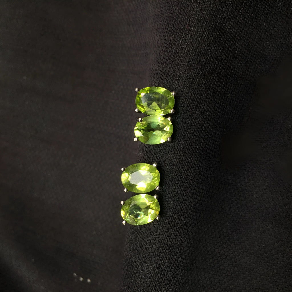 Grass green natural olivine oval stone stud earrings in S925 sterling silver.