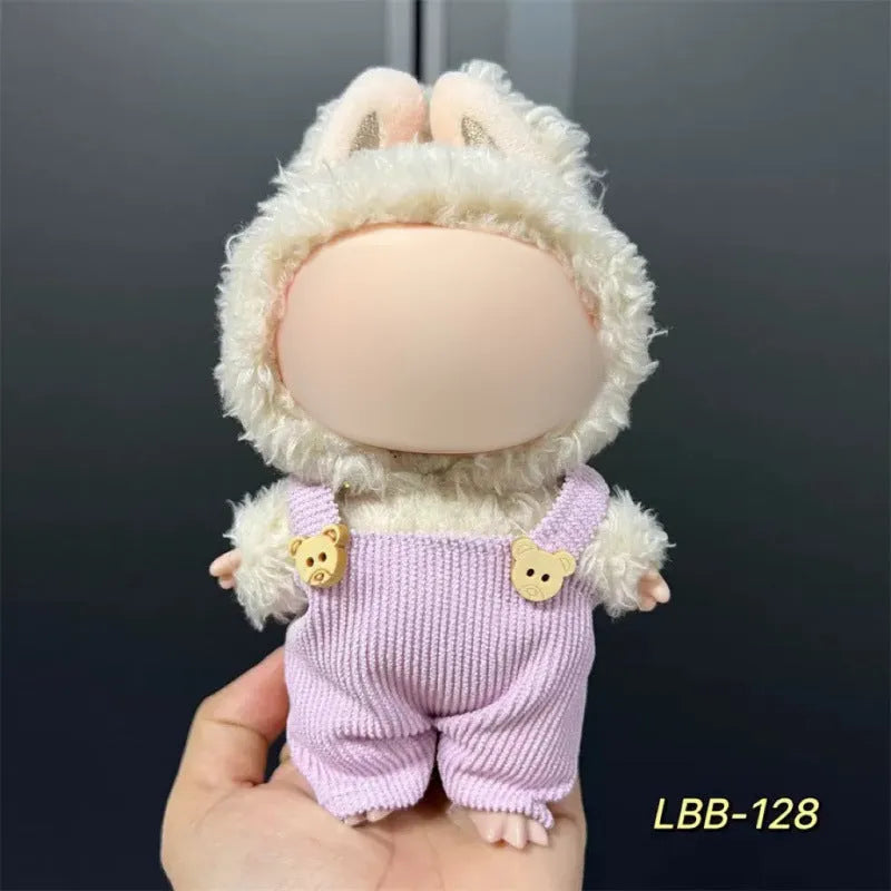 Plastic clothing outfit for a 17cm tall collectible vinyl figurine doll.