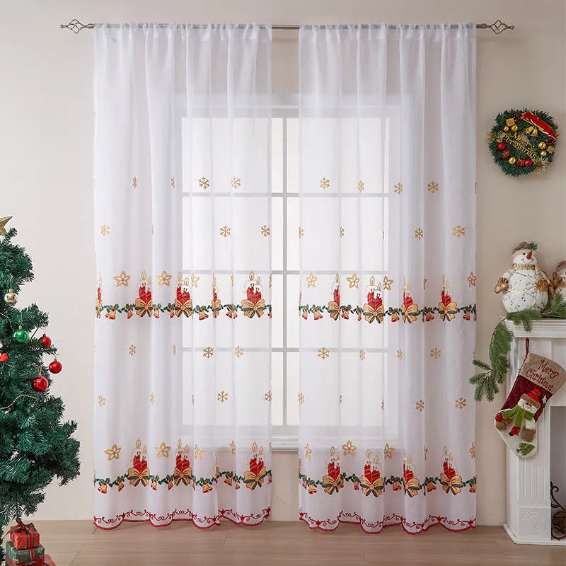 A pair of American-style Christmas curtains with white embroidered snowflakes on a red background.