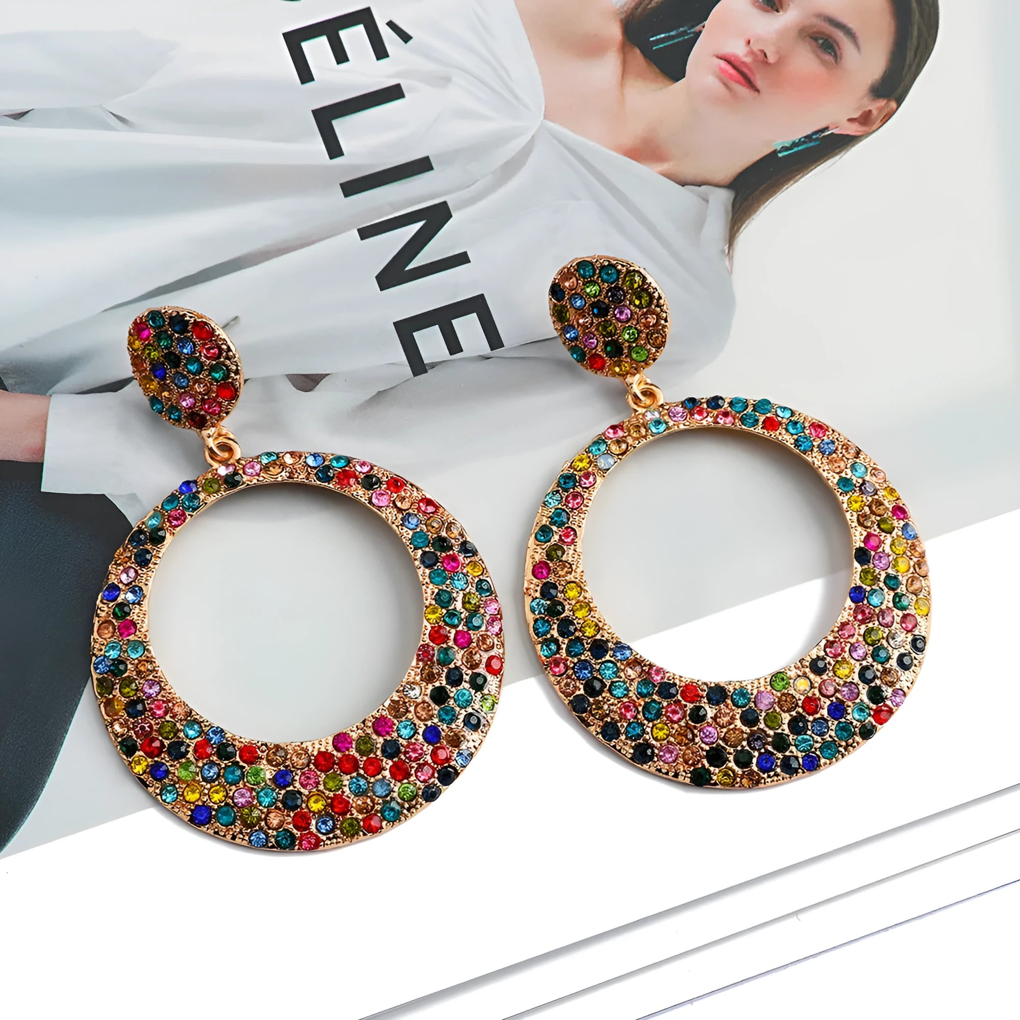 Colourful round pendant earrings with metal diamond detailing and cartoon style