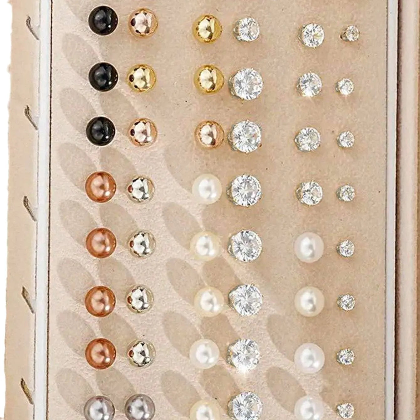 108 gold and yellow geometric alloy earrings with round bead details laid out flat.
