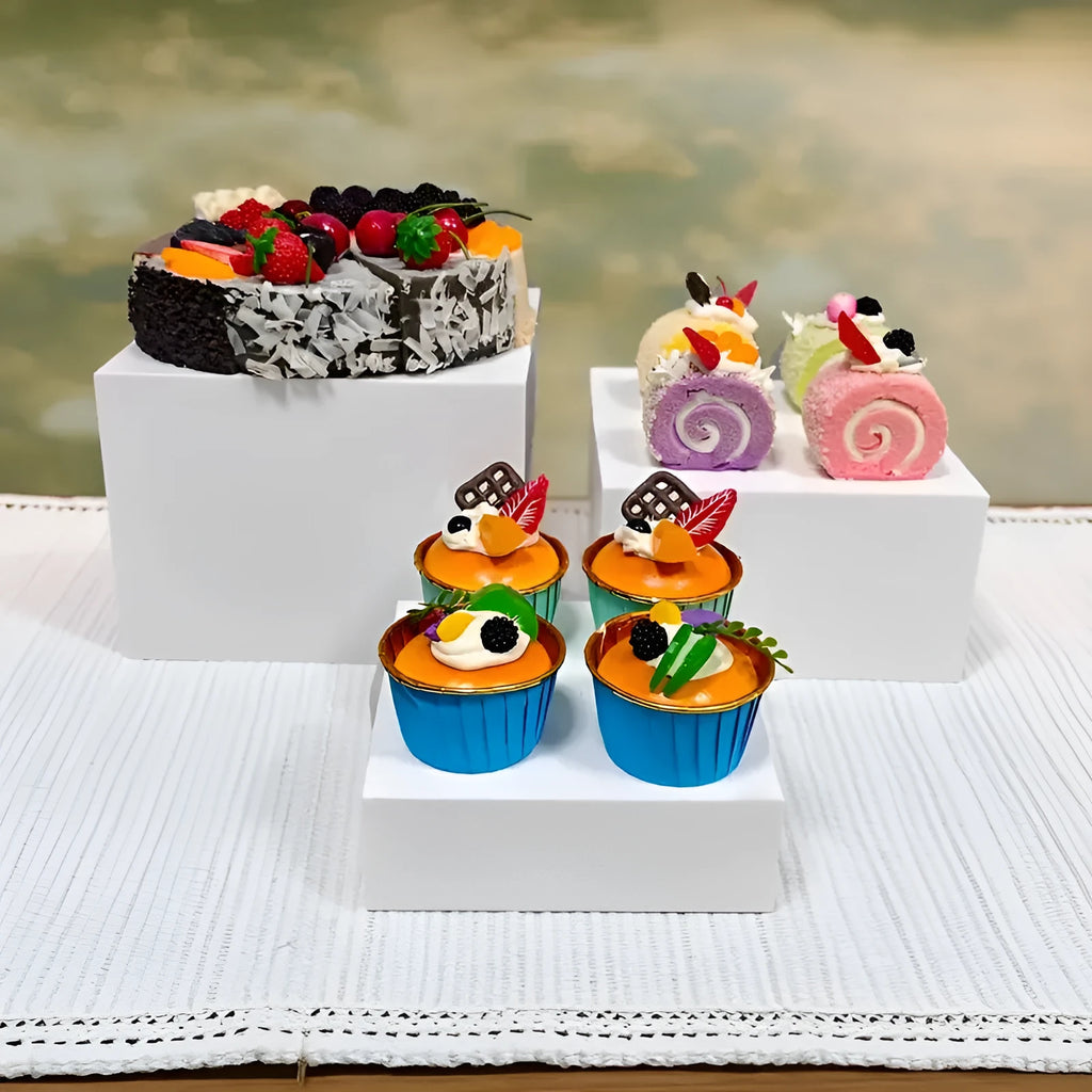 White plastic suit cube dessert display stand with six stackable pieces for table presentation