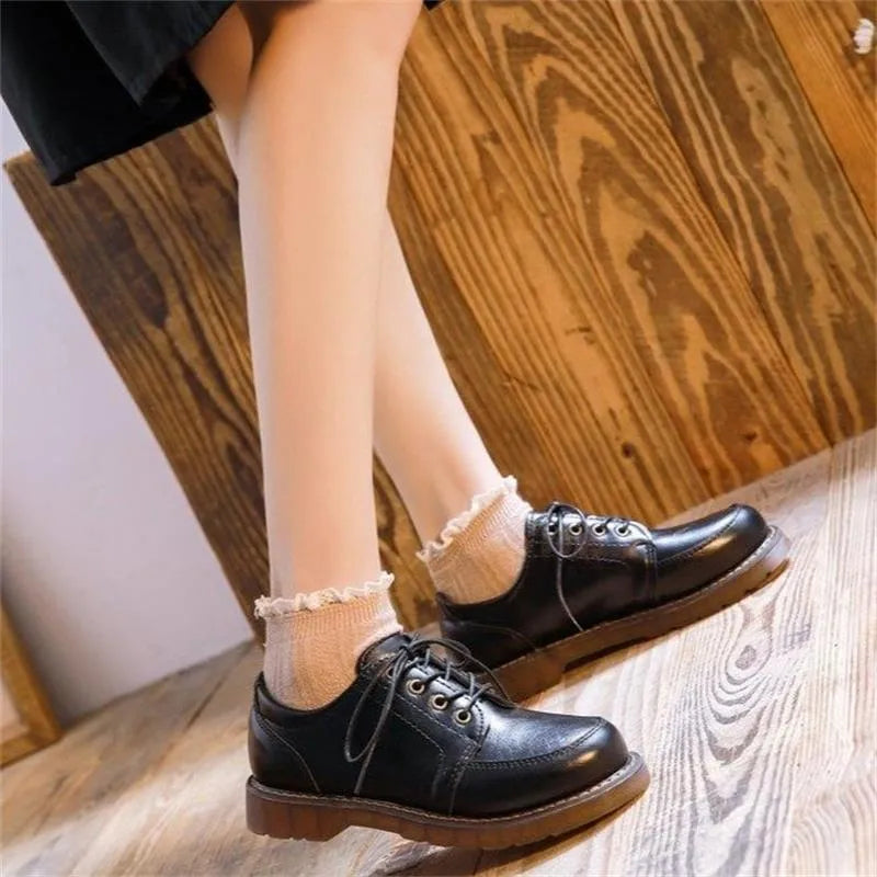 Women's preppy style Mary Jane pumps with round toe and front lace-up in black and brown