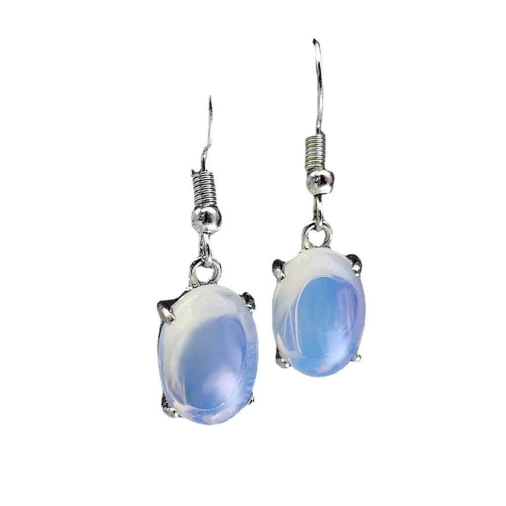 Opal earrings with retro moonstone aesthetic, cross design and ellipse pendant in drop shape