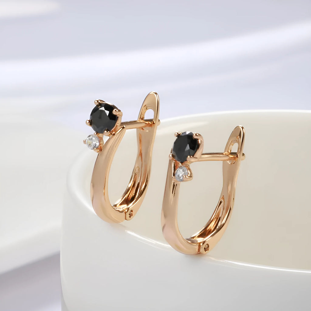 Women's gold-colour drop earrings with black agate geometric design and retro styling on ear clips