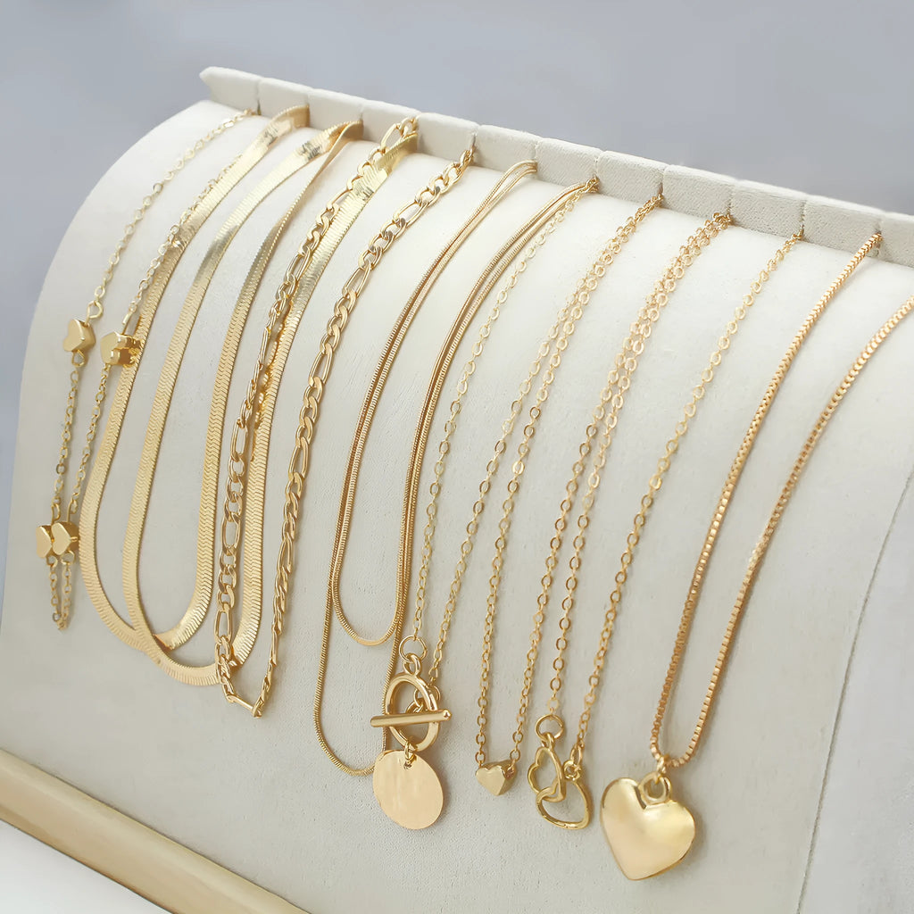 Gold electroplated women's necklace jewellery set with snake chain construction and alloy pendants