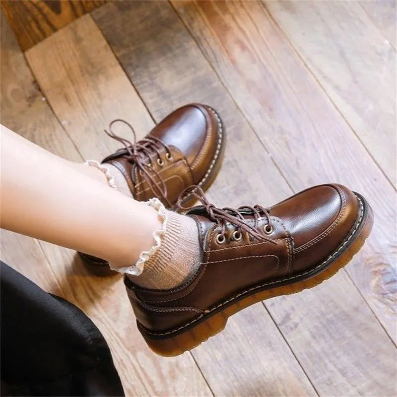 Women's preppy style Mary Jane pumps with round toe and front lace-up in black and brown
