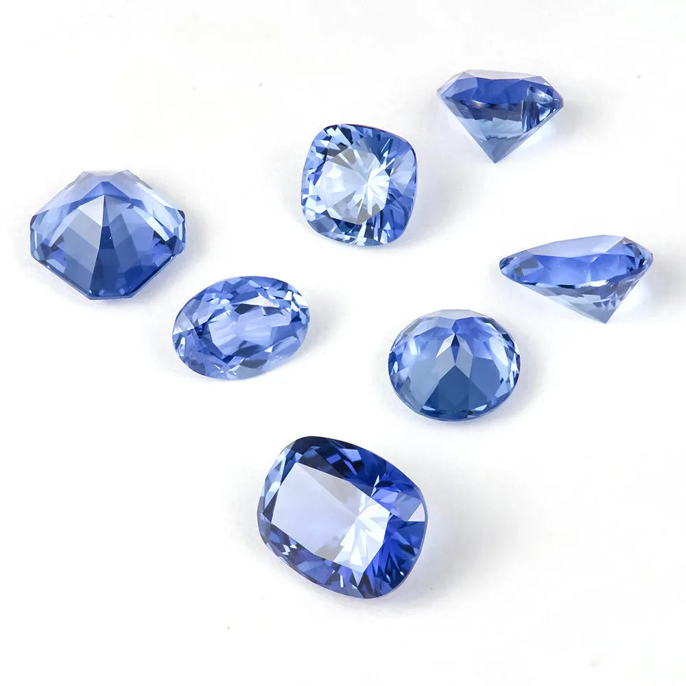 Royal blue loose gemstones in heart, round, egg, fat square, pear, and asche cuts for jewellery making