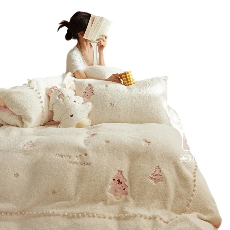 Milk fibre bedding four-piece set with green Christmas tree pattern showing quilt cover, sheet, and pillowcase