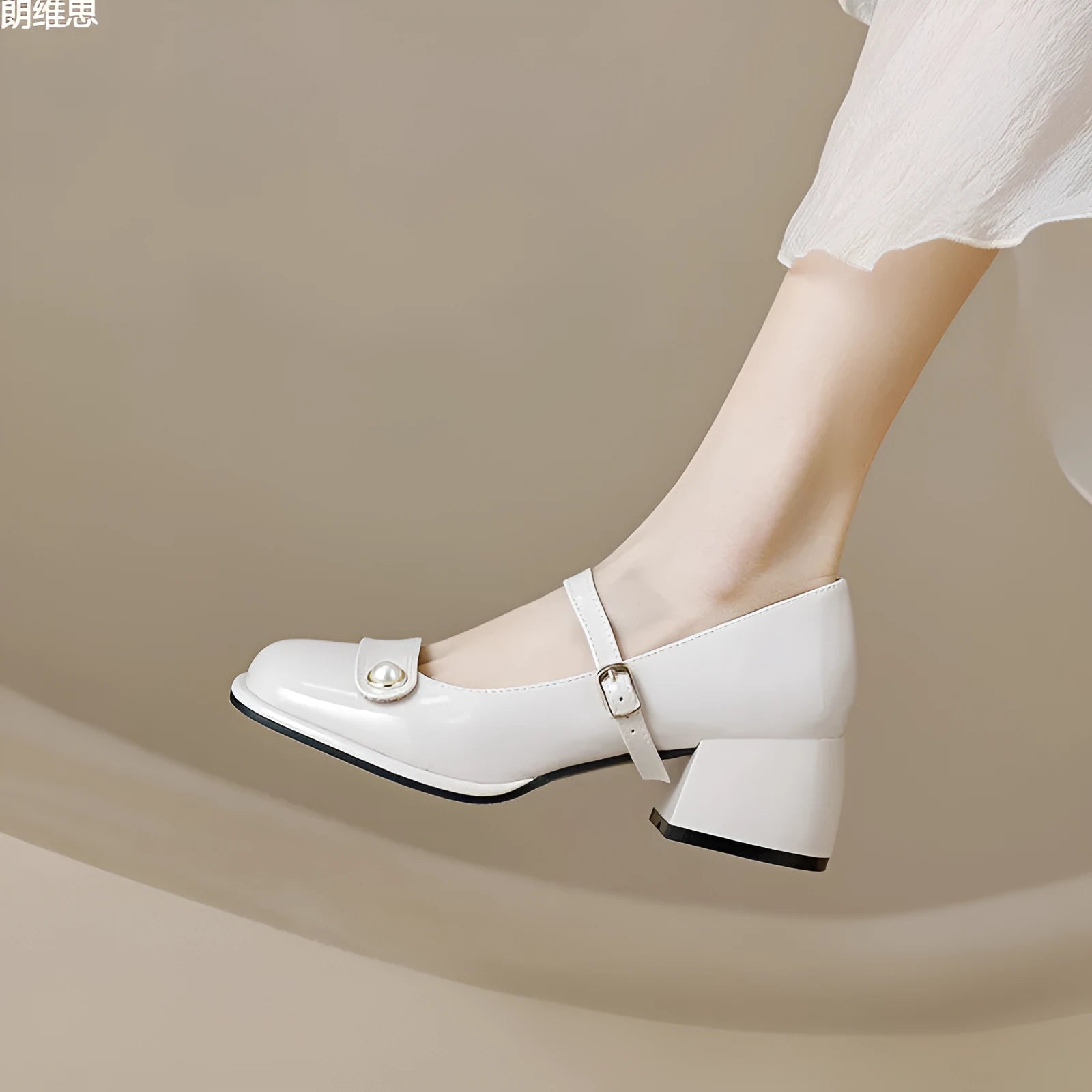 Women's patent leather ankle boots with chunky heels and square toe in apricot colour with buckle fastening