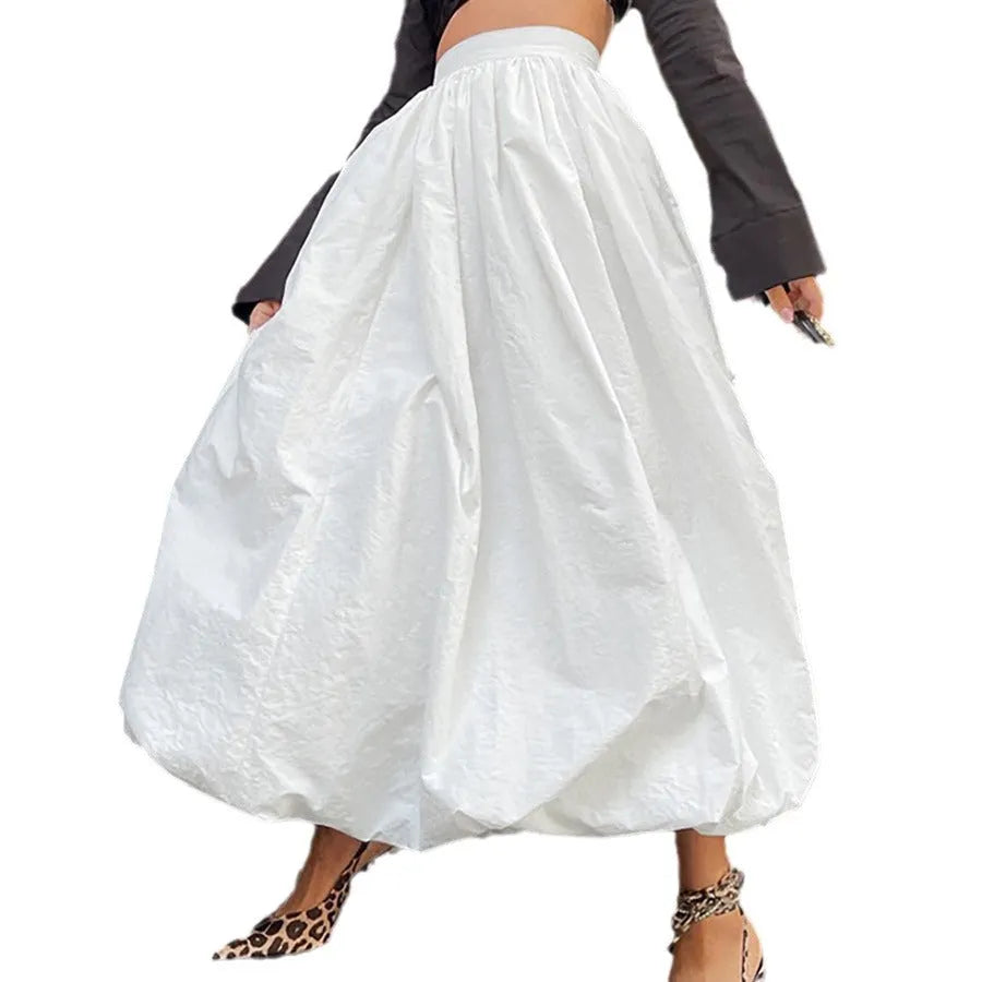 Women's solid colour long cotton skirt in black on a hanger
