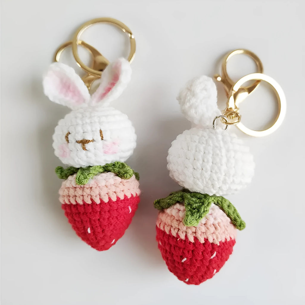 White hand-woven wire pendant with rabbit strawberry pattern and keychain attachment
