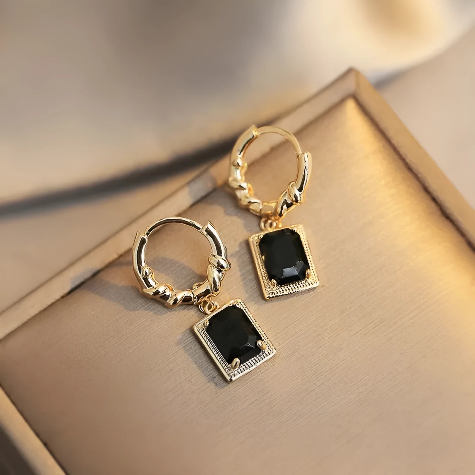 Black geometric quadrilateral zircon earrings with French court retro design on copper alloy