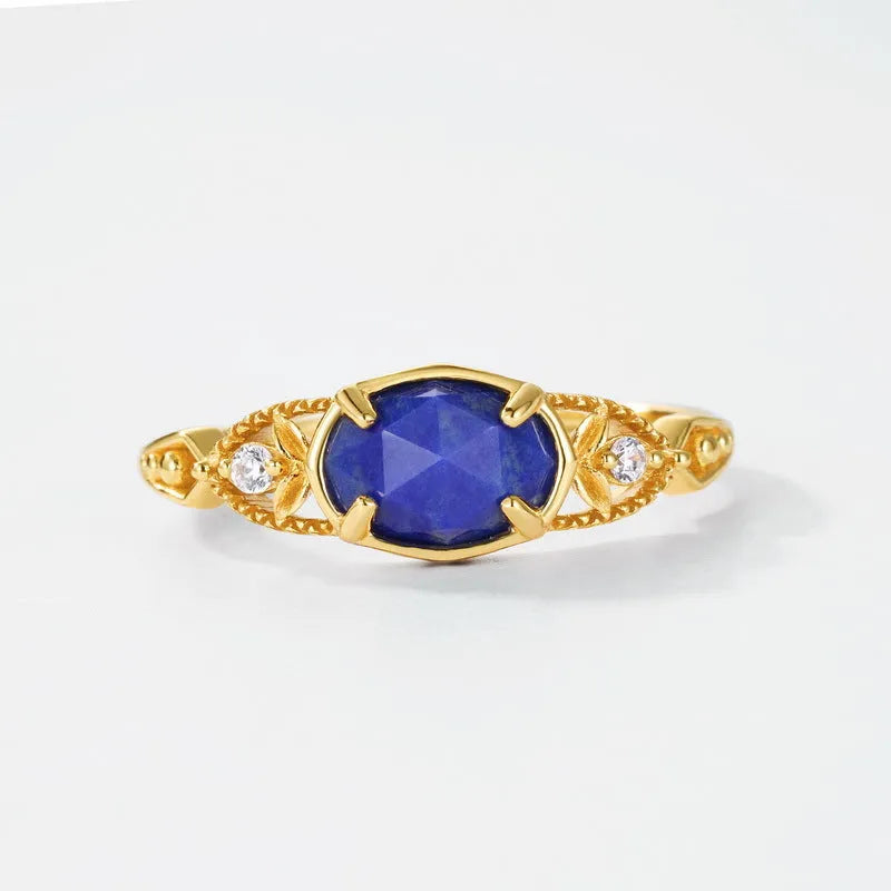 Geometric ellipse silver alloy ring with a round blue lapis lazuli stone, Japanese style design.