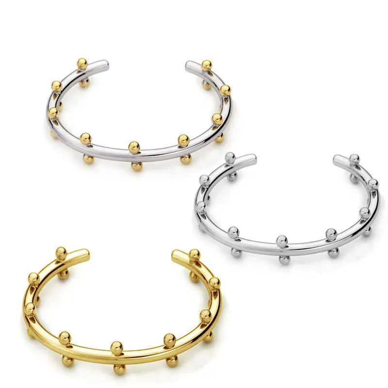 Stainless steel C-shaped bean bead bracelet with personality texture rivet design in gold finish