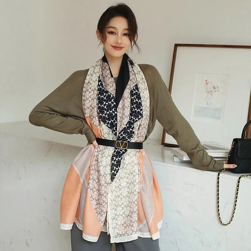 A woman's elegant polyester shawl scarf in a mid-length style, dimensions 180cm by 90cm.
