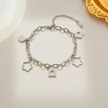 Titanium steel flower small pendant bracelet for women in gold electroplated finish