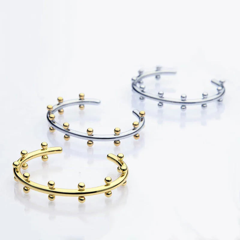 Stainless steel C-shaped bean bead bracelet with personality texture rivet design in gold finish