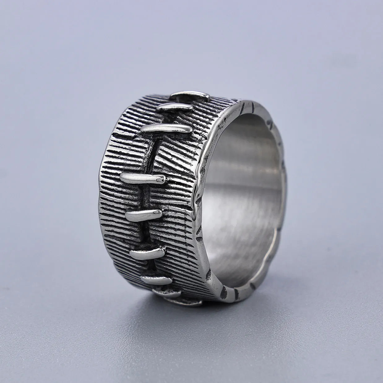 Dark punk stitched titanium steel ring with double U-shaped geometric design in retro colour