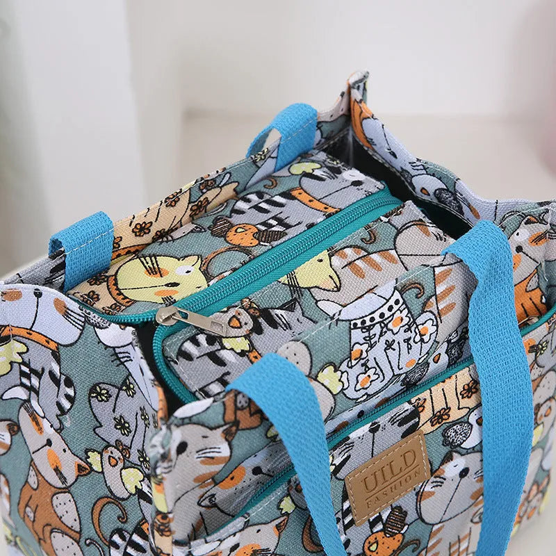 Women's large printed canvas tote bag with aluminium handles in floral and animal patterns