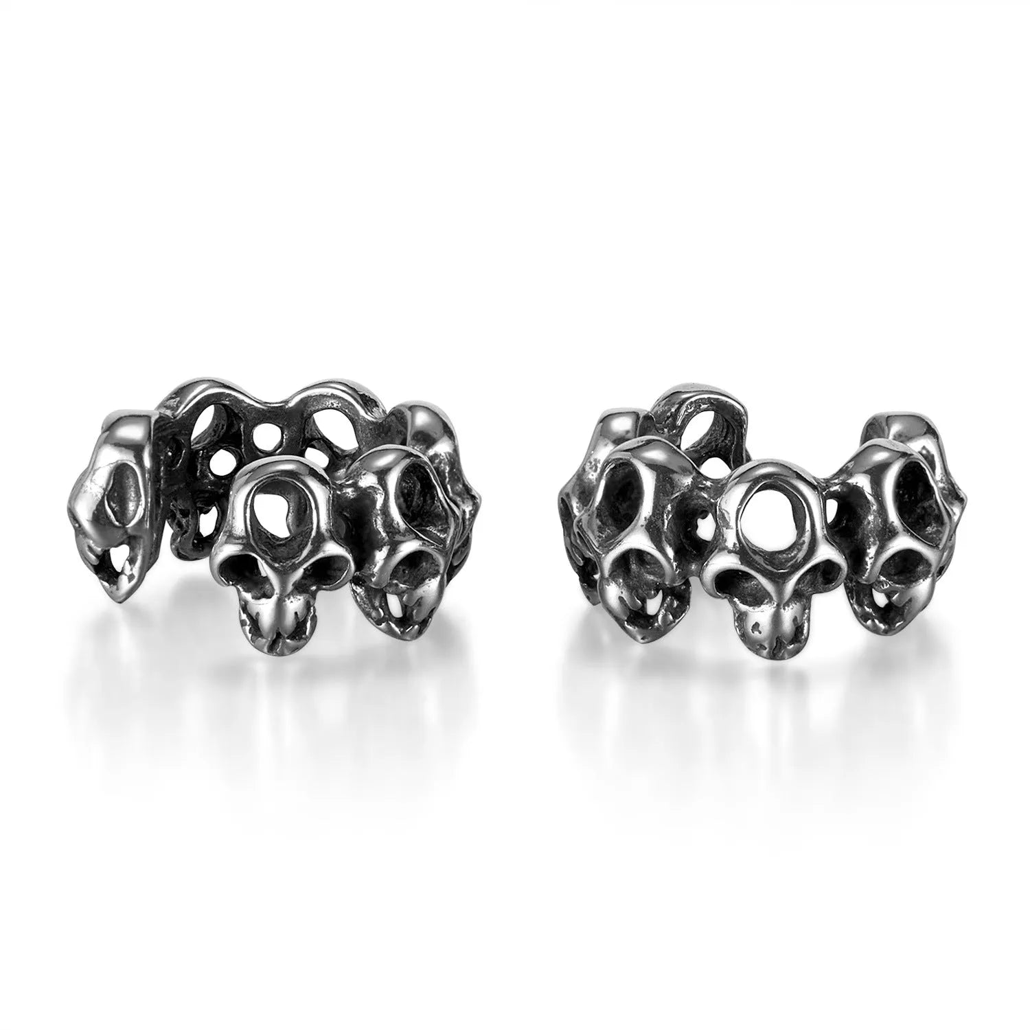 Stainless steel hollow skull ear clips with geometric design and steel colour finish