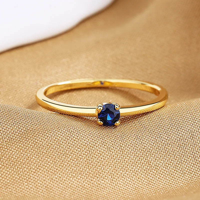 Women's simple single diamond fine circle ring in copper with geometric round shape