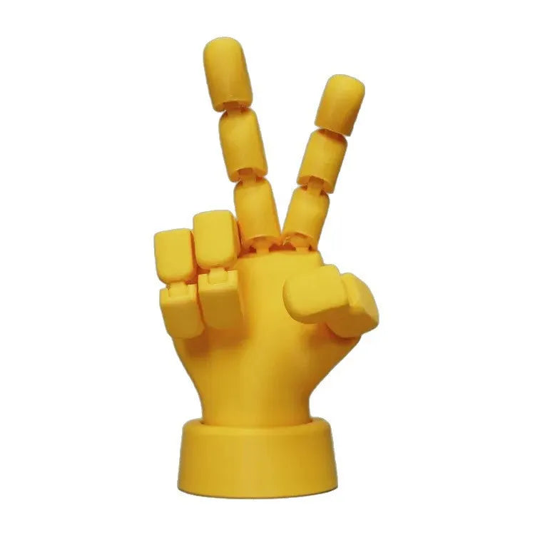 Yellow PLA movable joint hand props for stop motion animation measuring 5x5.38x7.5cm