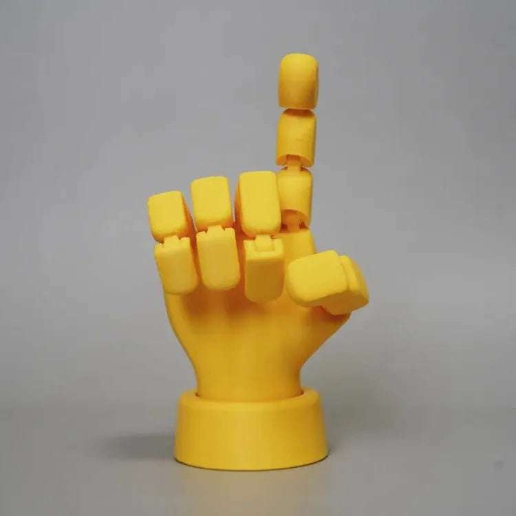 Yellow PLA movable joint hand props for stop motion animation measuring 5x5.38x7.5cm