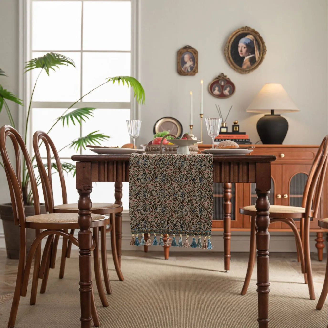 Rhyme Nordic jacquard table runner with tassel trim in a striped pattern, laid flat on a wooden table.